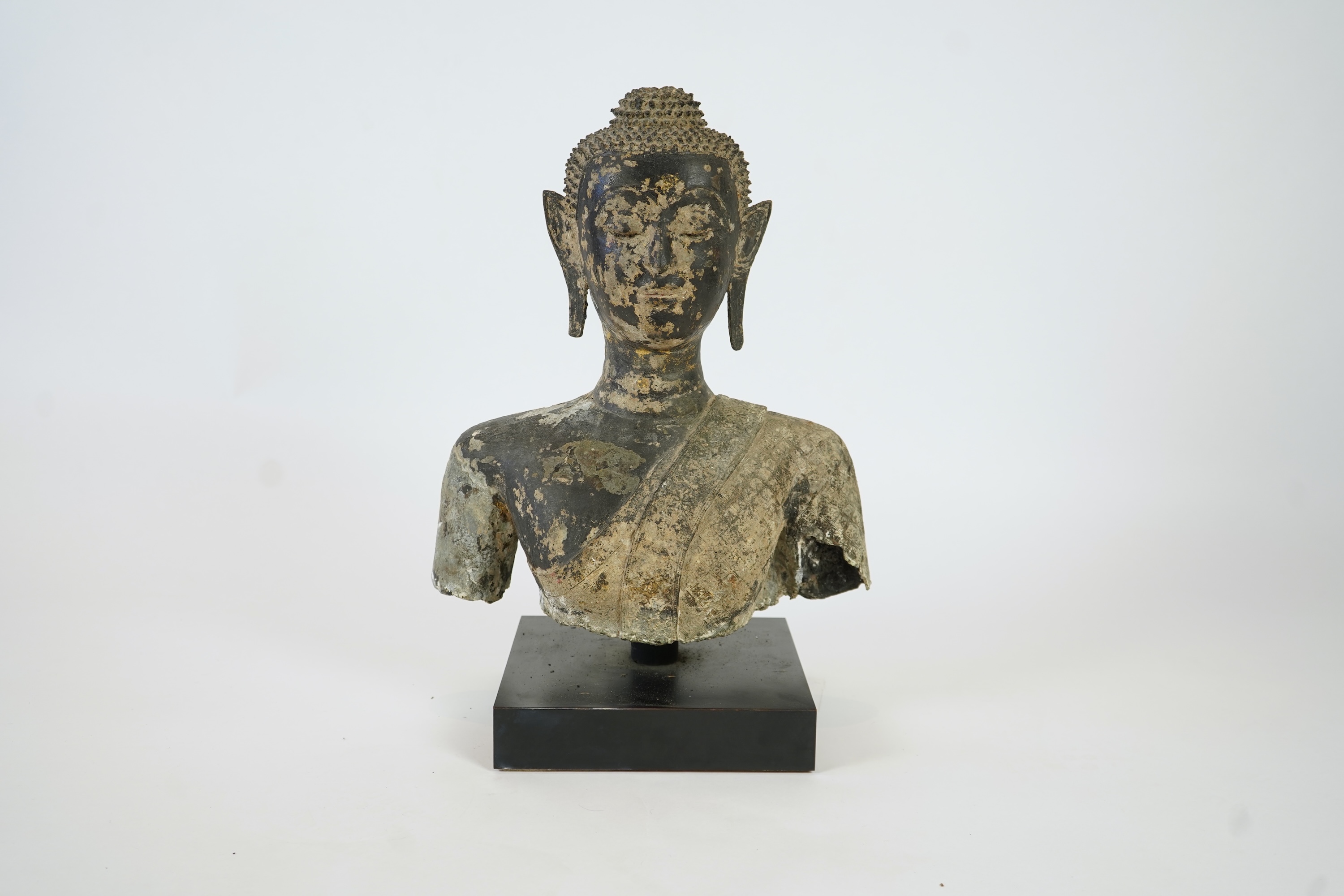A large Thai lacquered bronze bust of Buddha, 17th/18th century